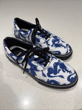 RAAD Shop - Japanese Dragons in Navy Blue on a White background.  Black leathers